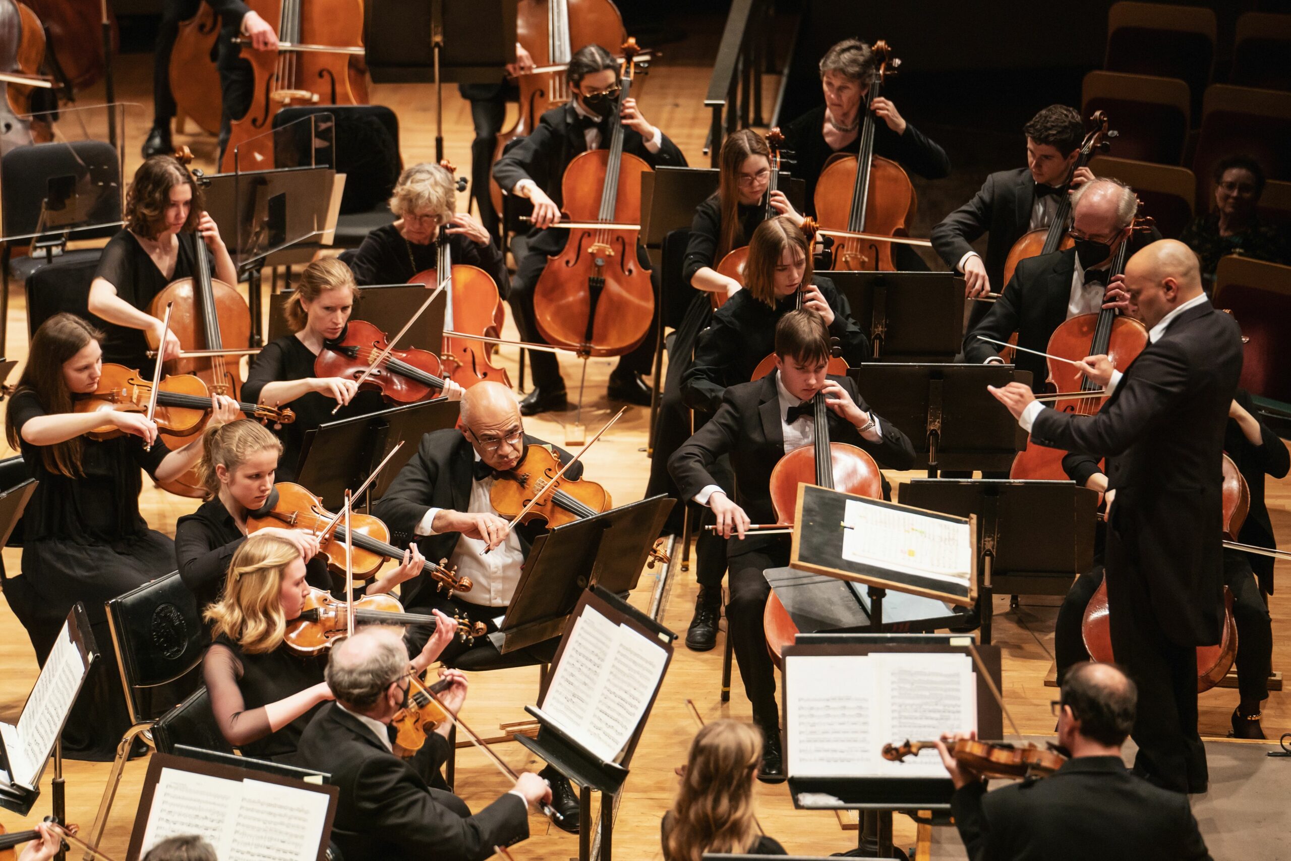 Colorado Symphony Cello Section performs under the baton of Resident Conductor Christopher Dragon