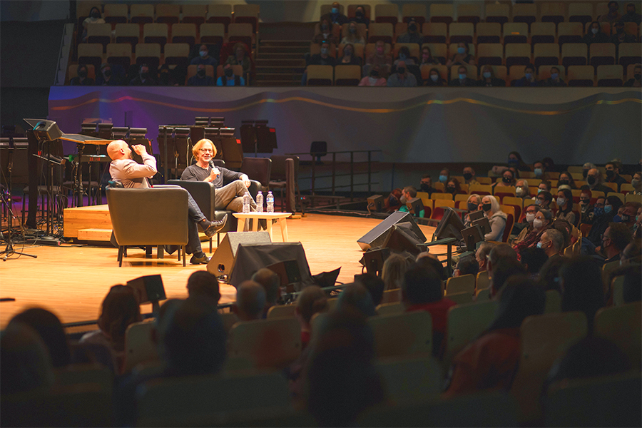 Resident Conductor Christopher Dragon speaks with Composer Danny Elfman on stage at Boettcher Concert Hall.